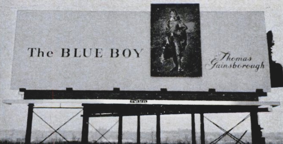 Black and white picture of a billboard that reads "The Blue Boy"